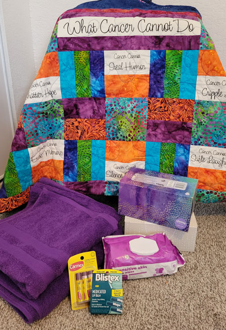 Quilt/Blanket, Plush Towels, Quality Facial Tissue, Pop-Top Wipes, Lip Balm